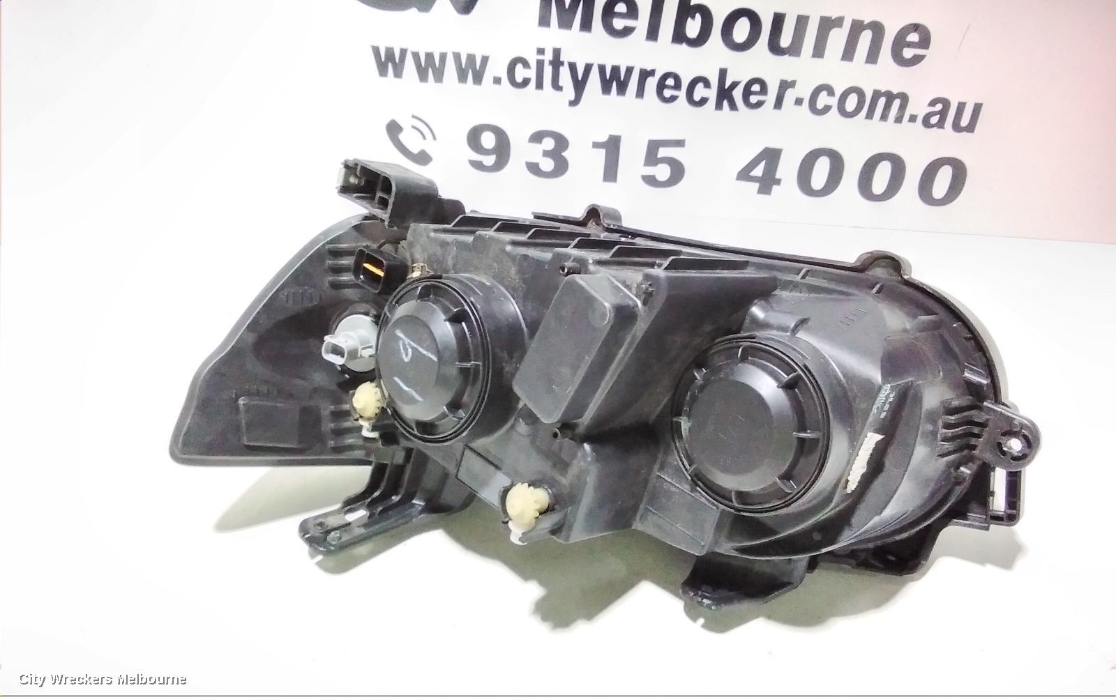 HOLDEN BARINA RIGHT HEADLAMP, TM, W/ CHROME RING TYPE, 11/2011 - 08/2016