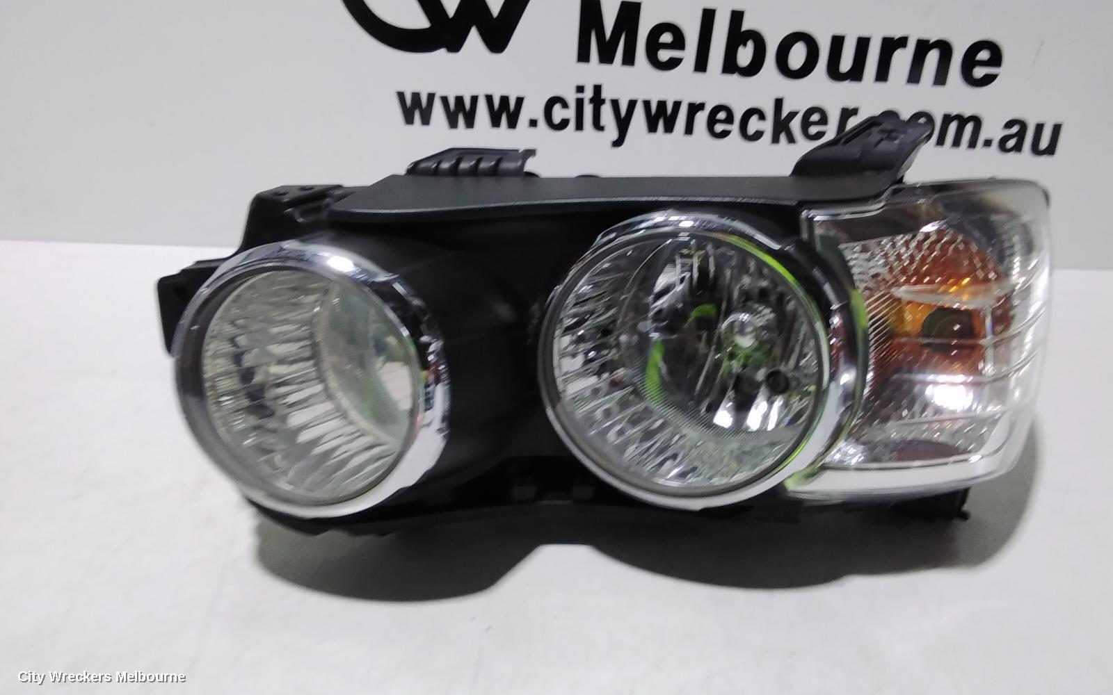 HOLDEN BARINA LEFT HEADLAMP, TM, W/ CHROME RING TYPE, 11/2011 - 08/2016