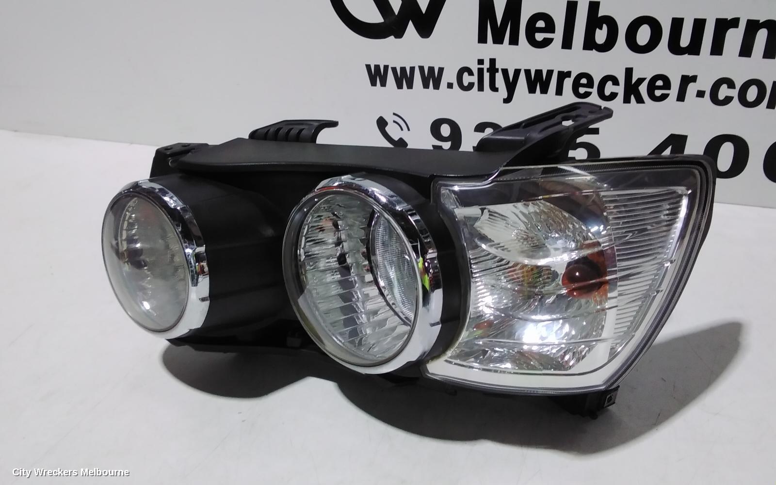 HOLDEN BARINA LEFT HEADLAMP, TM, W/ CHROME RING TYPE, 11/2011 - 08/2016