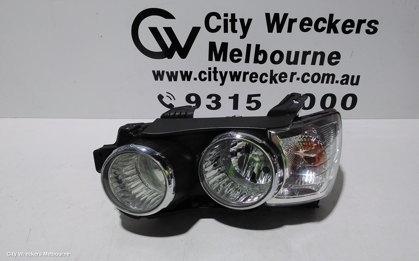HOLDEN BARINA LEFT HEADLAMP, TM, W/ CHROME RING TYPE, 11/2011 - 08/2016