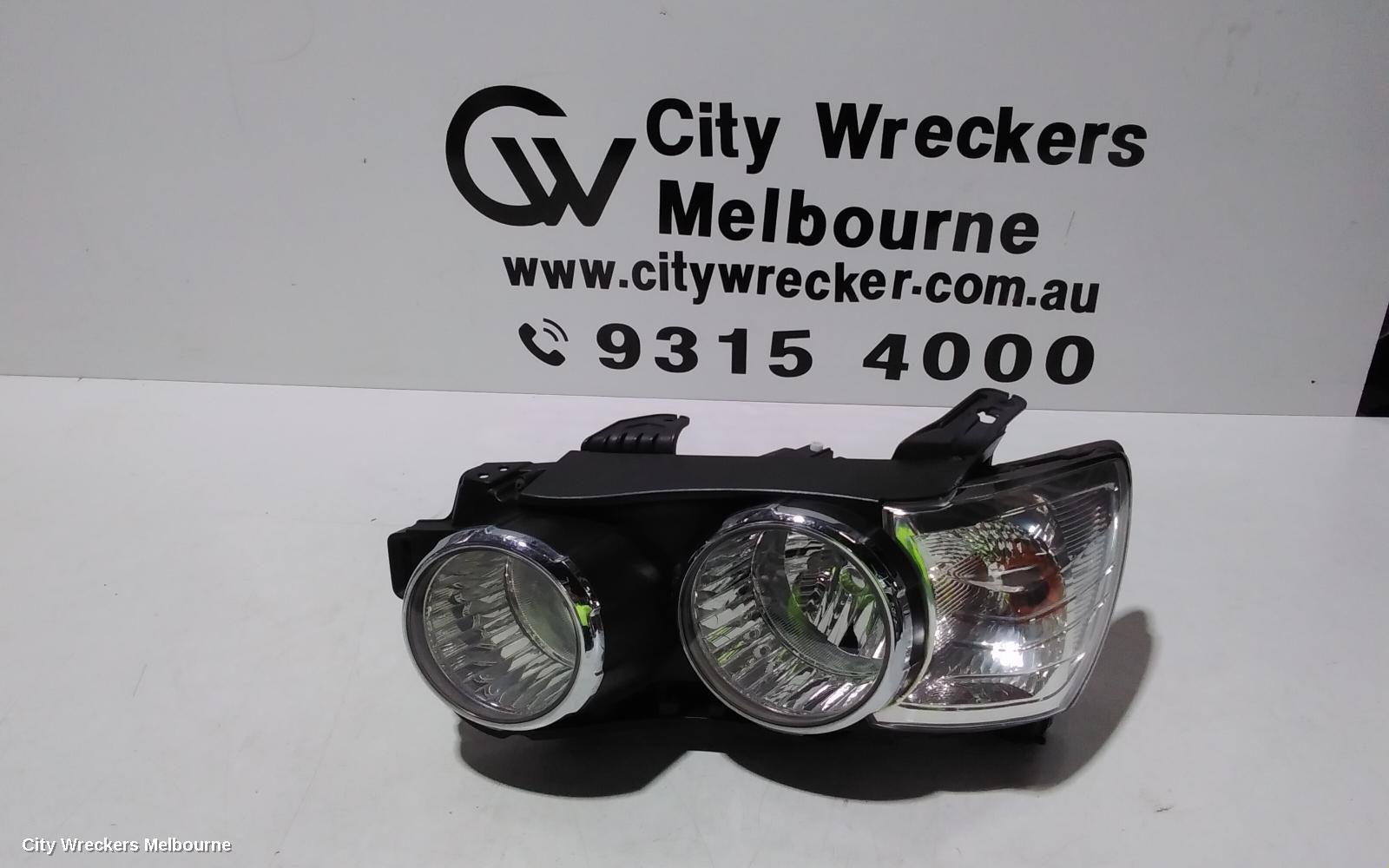 HOLDEN BARINA LEFT HEADLAMP, TM, W/ CHROME RING TYPE, 11/2011 - 08/2016