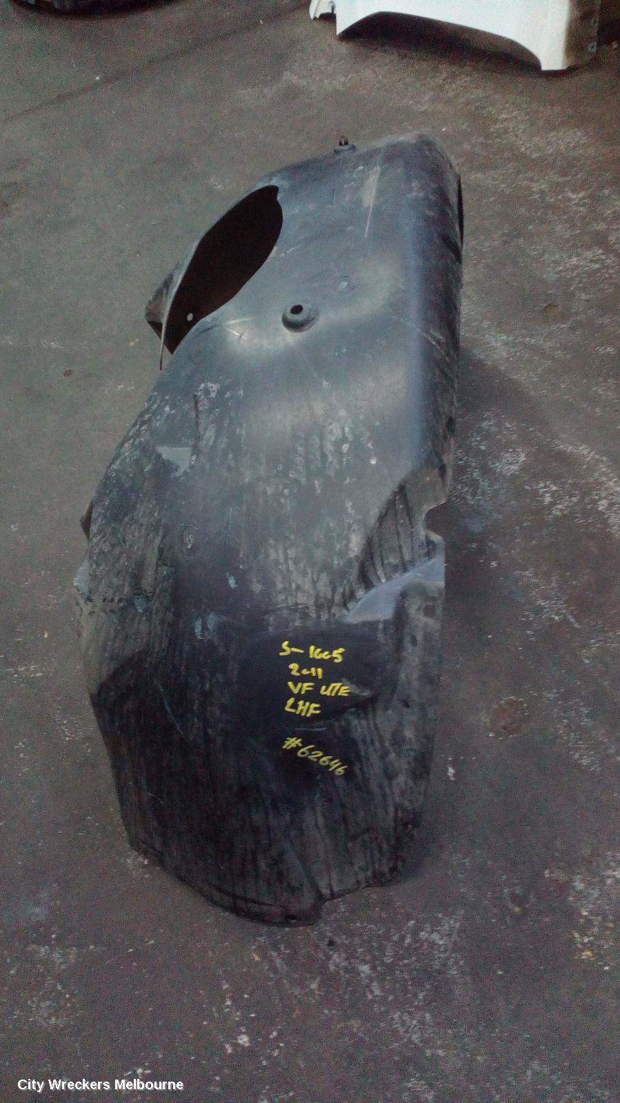 HOLDEN COMMODORE LEFT GUARD LINER, VE, FRONT, 08/2006 - 04/2013