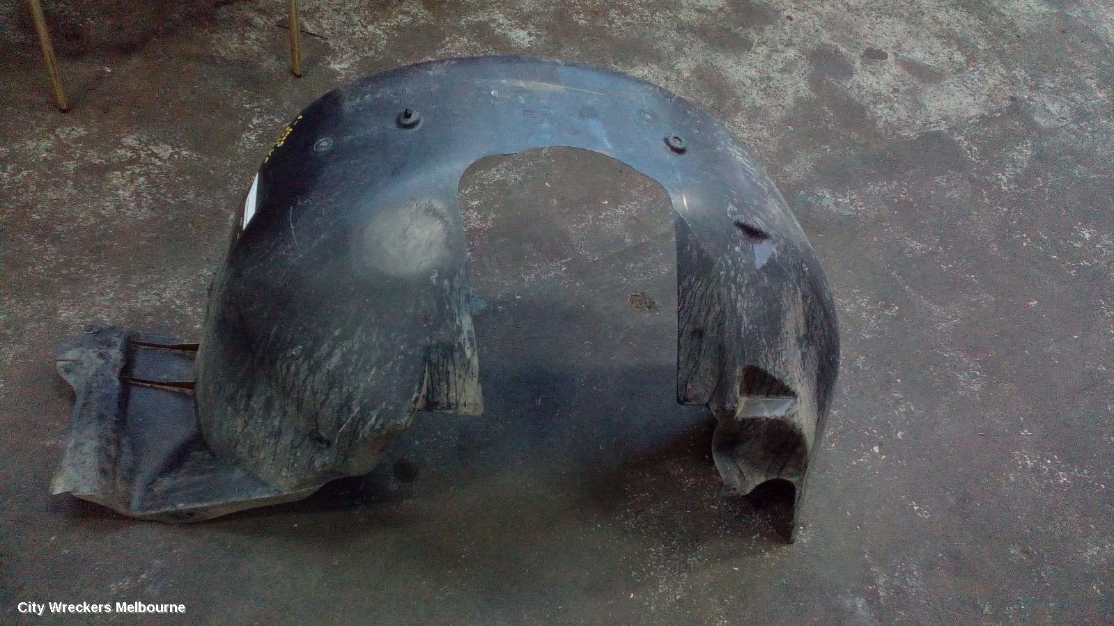 HOLDEN COMMODORE LEFT GUARD LINER, VE, FRONT, 08/2006 - 04/2013