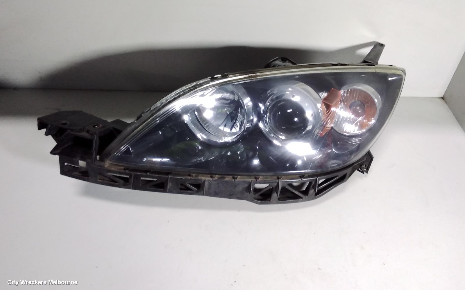 MAZDA 3 LEFT HEADLAMP, BK, SEDAN, NON HID, MANUAL ADJUST TYPE, 10/2003 - 04/2009