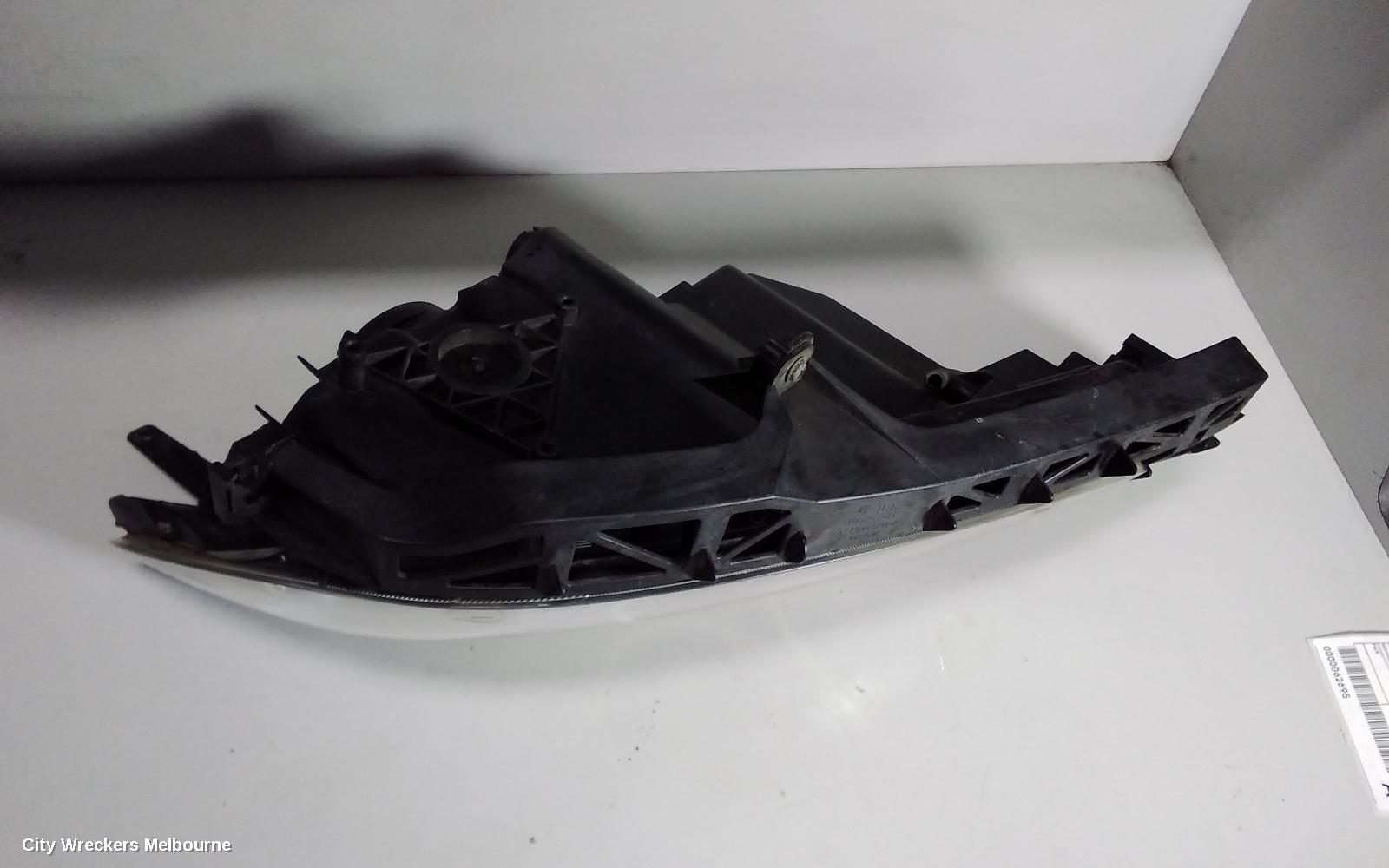 MAZDA 3 LEFT HEADLAMP, BK, SEDAN, NON HID, MANUAL ADJUST TYPE, 10/2003 - 04/2009