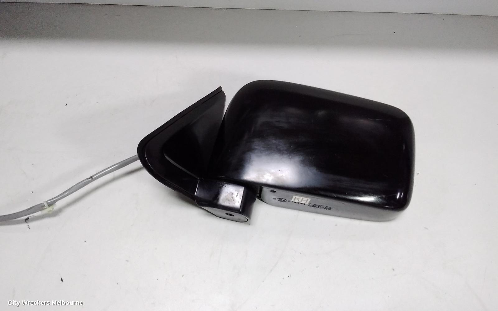 NISSAN NAVARA LEFT DOOR MIRROR, D22, MANUAL, TRAY BACK, LONG ARM TYPE, 04/1997 - 08/2015