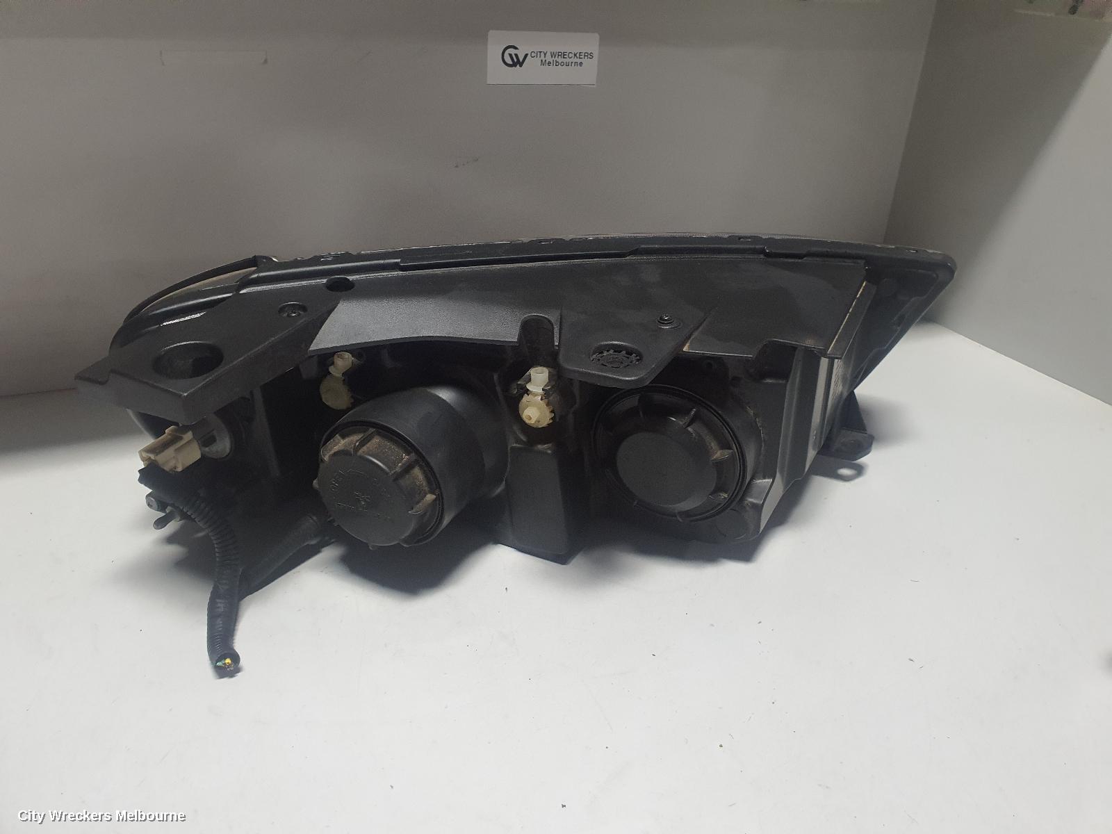 HOLDEN CAPTIVA LEFT HEADLAMP, CG, CAPTIVA 7 (4TH VIN = C), GREY SURROUND, 01/2011 - 09/2015
