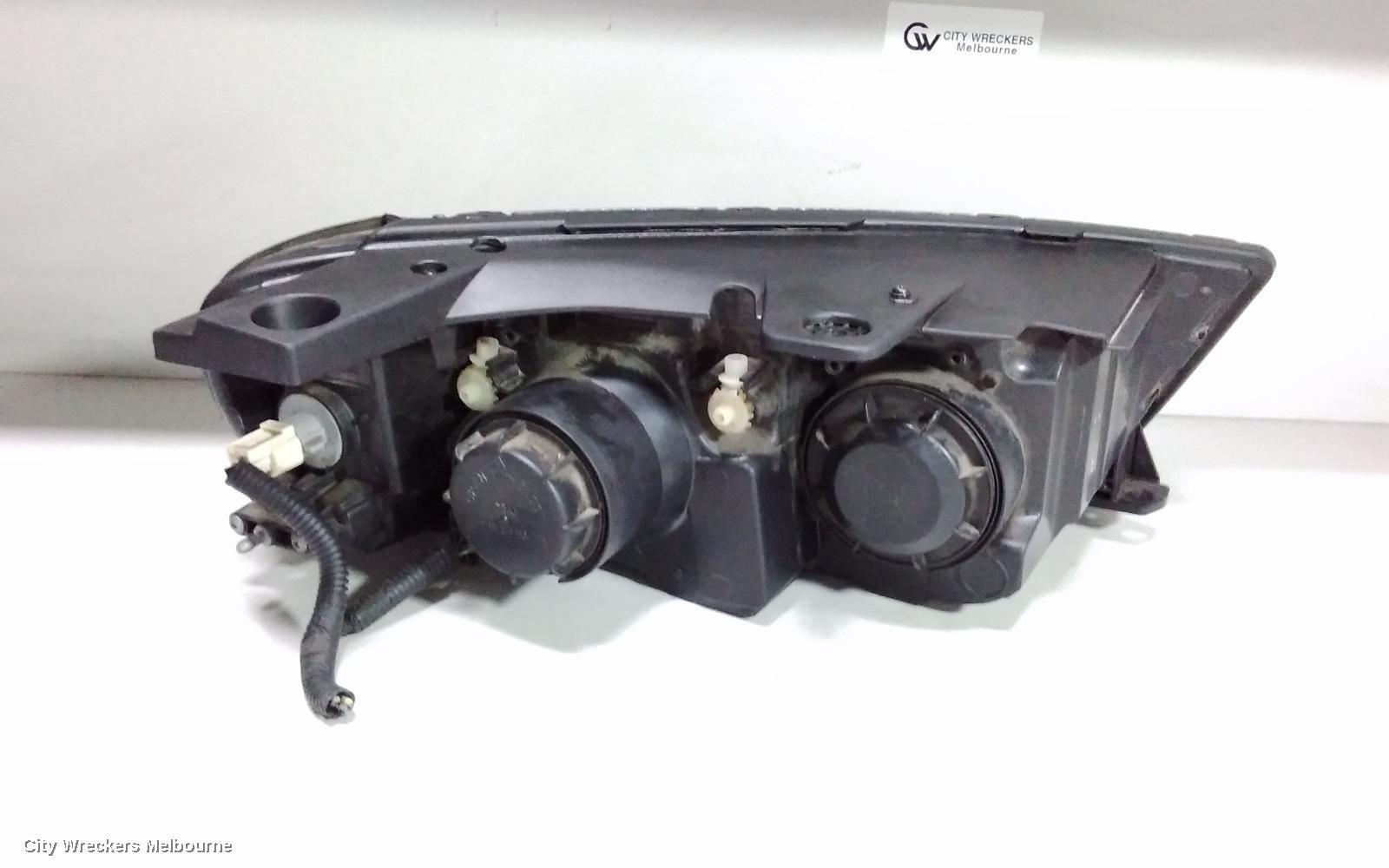 HOLDEN CAPTIVA LEFT HEADLAMP, CG, CAPTIVA 7 (4TH VIN = C), GREY SURROUND, 01/2011 - 09/2015