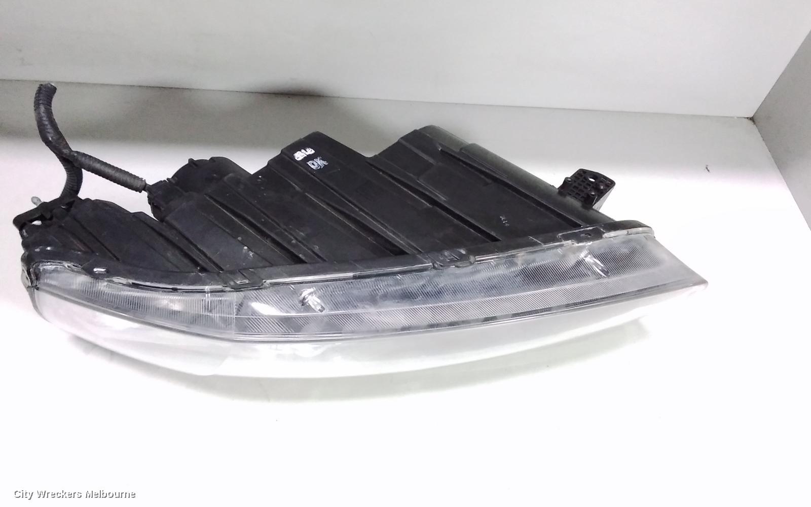 HOLDEN CAPTIVA LEFT HEADLAMP, CG, CAPTIVA 7 (4TH VIN = C), GREY SURROUND, 01/2011 - 09/2015