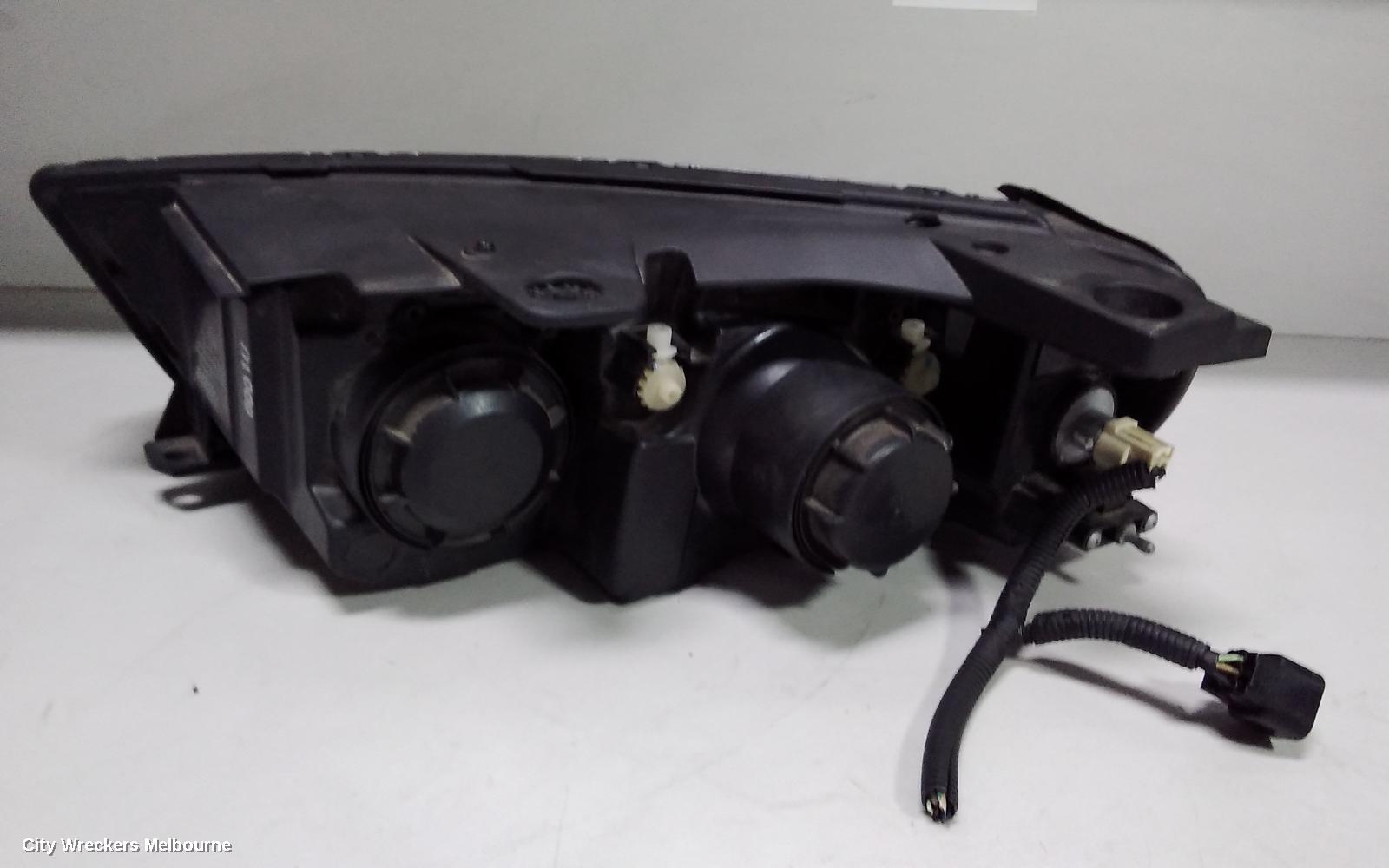 HOLDEN CAPTIVA RIGHT HEADLAMP, CG, CAPTIVA 7 (4TH VIN = C), BLACK SURROUND, 01/2011 - 09/2015