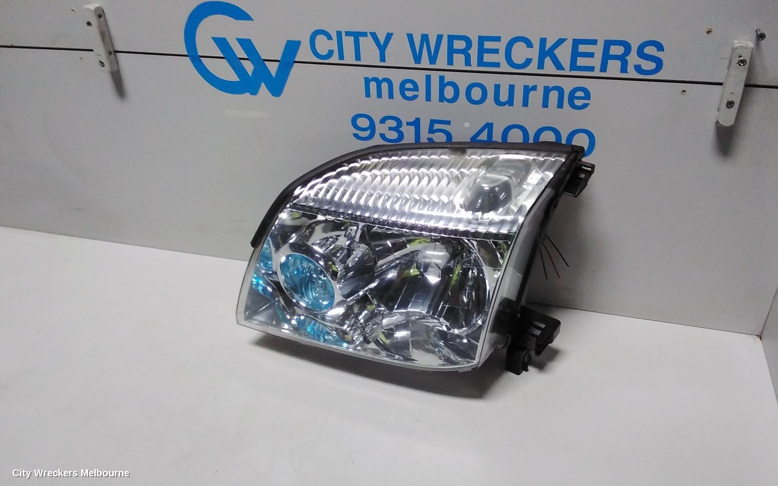 NISSAN XTRAIL LEFT HEADLAMP, T30, BLUE LENS TYPE, 10/2001 - 09/2007