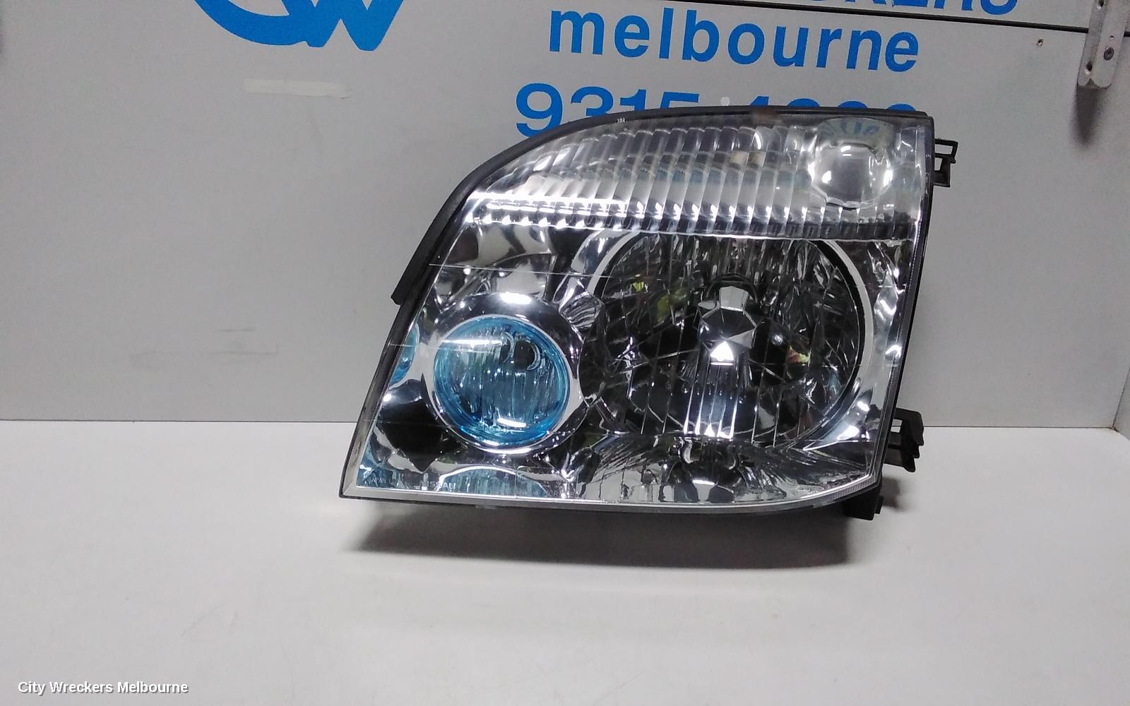 NISSAN XTRAIL LEFT HEADLAMP, T30, BLUE LENS TYPE, 10/2001 - 09/2007