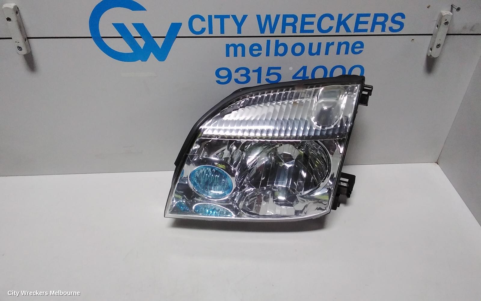 NISSAN XTRAIL LEFT HEADLAMP, T30, BLUE LENS TYPE, 10/2001 - 09/2007