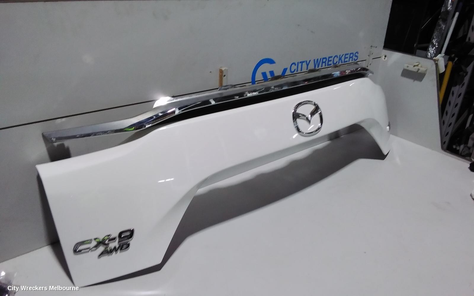 MAZDA CX9 REAR GARNISH, TAILGATE GARNISH-LOWER, COLOUR CODED, TC, 07/2016 ONWARDS
