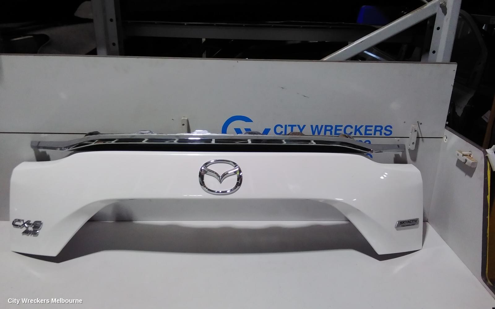 MAZDA CX9 REAR GARNISH, TAILGATE GARNISH-LOWER, COLOUR CODED, TC, 07/2016 ONWARDS