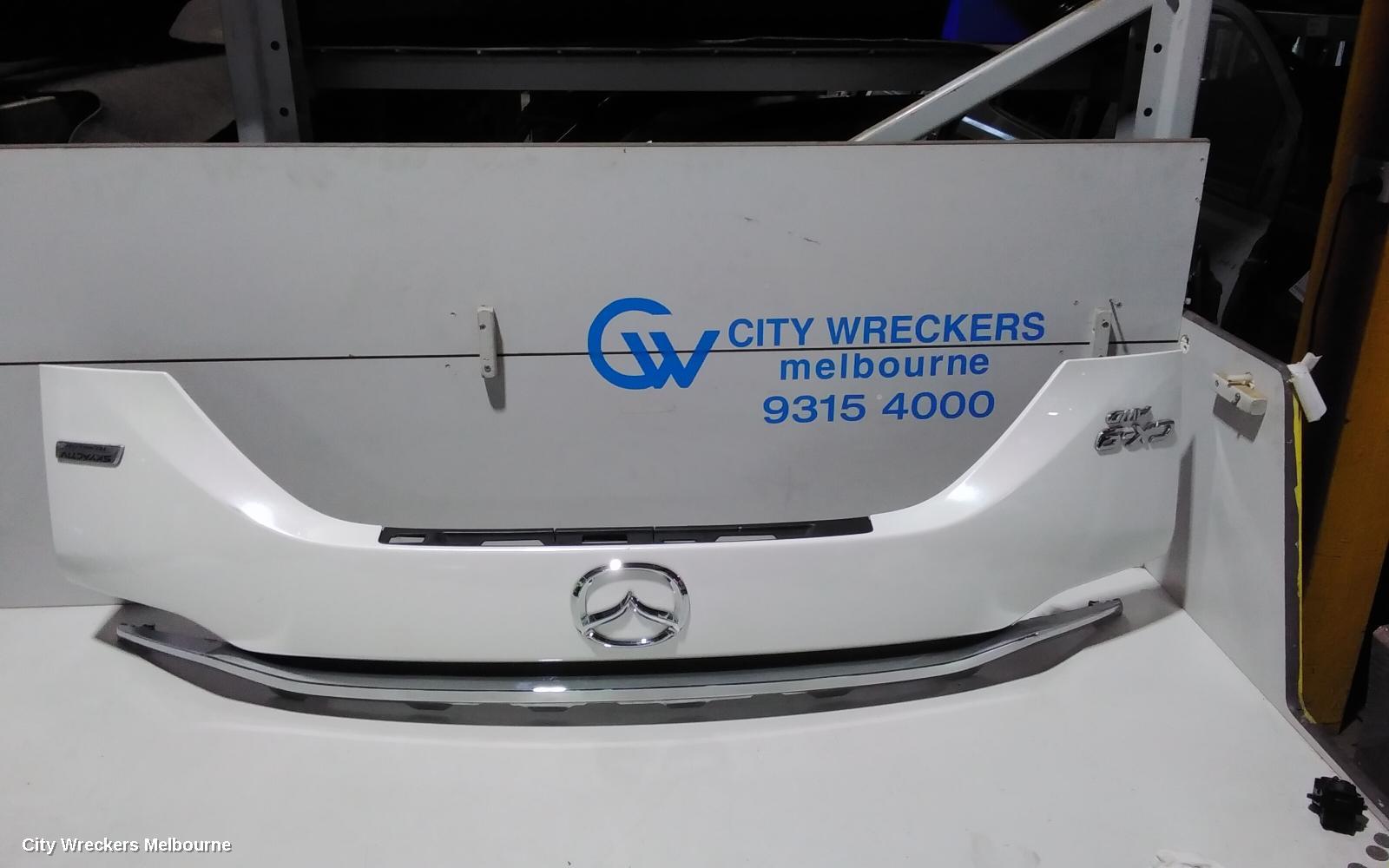 MAZDA CX9 REAR GARNISH, TAILGATE GARNISH-LOWER, COLOUR CODED, TC, 07/2016 ONWARDS