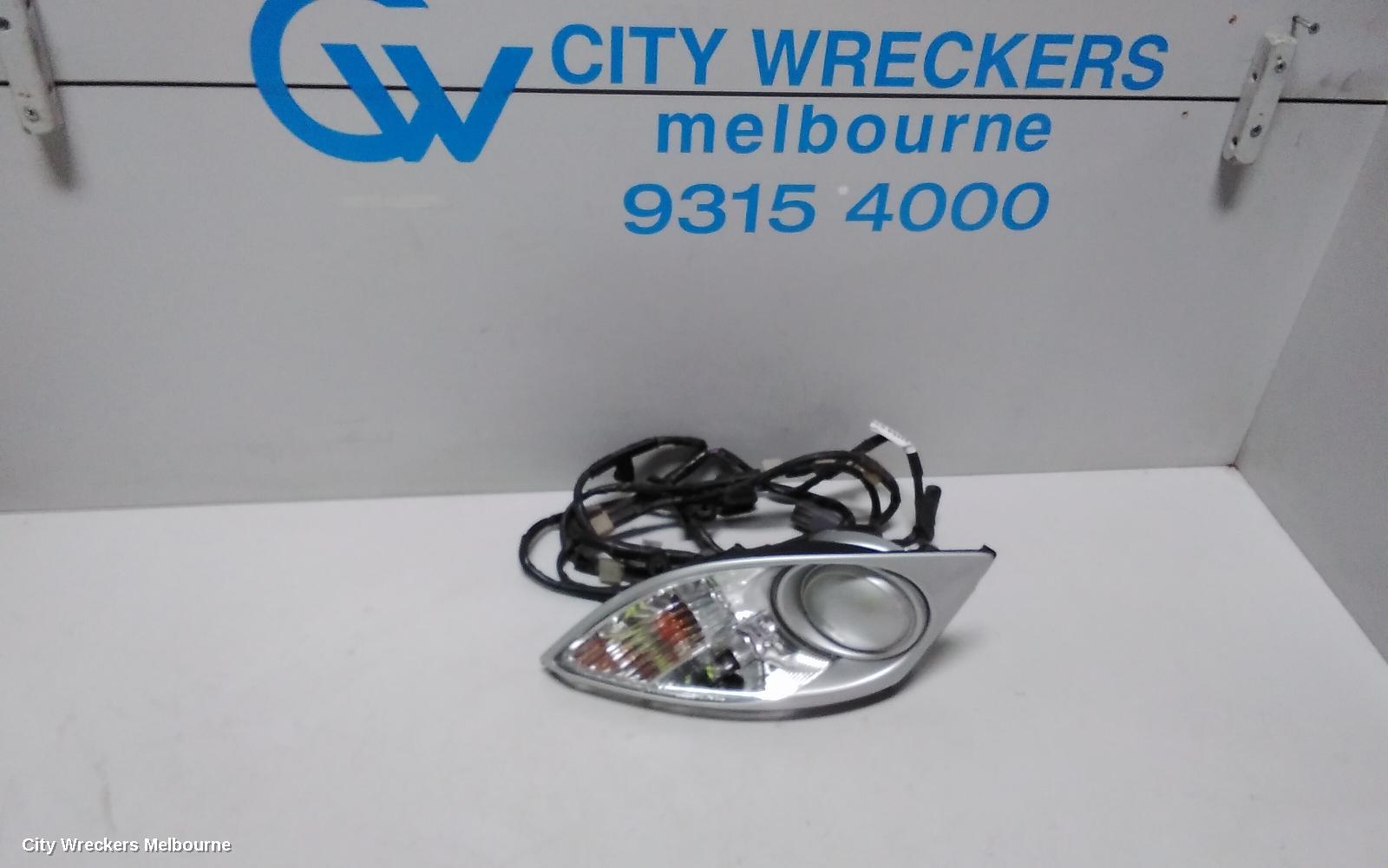 MAZDA CX7 LEFT INDICATOR/FOG/SIDE, BUMPER FLASHER, ER, 10/2009 - 02/2012