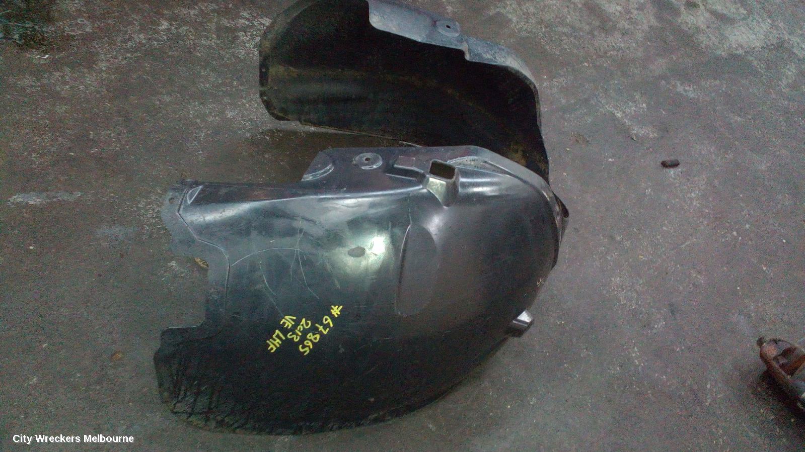 HOLDEN COMMODORE LEFT GUARD LINER, VE, FRONT, 08/2006 - 04/2013