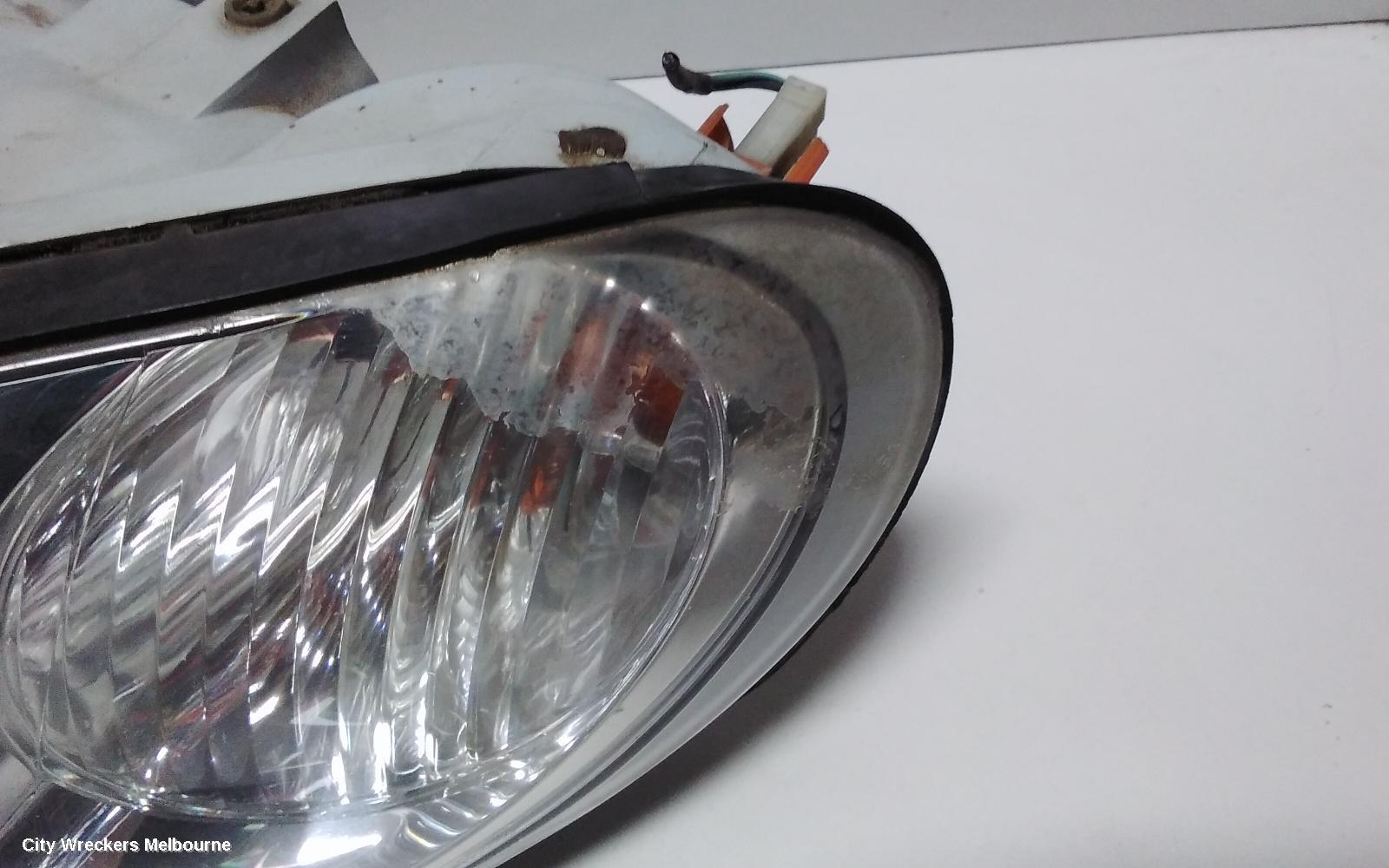HOLDEN COMMODORE LEFT HEADLAMP, VX, EXECUTIVE/ACCLAIM/S PACK, CHROME INSERT TYPE, 10/2000 - 09/2002