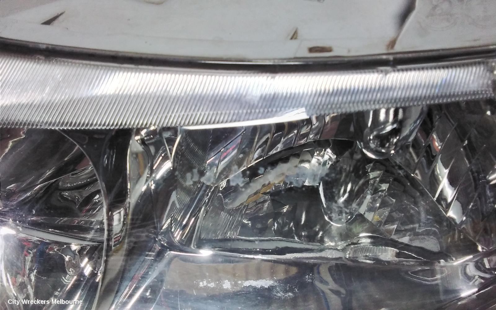 HOLDEN COMMODORE LEFT HEADLAMP, VX, EXECUTIVE/ACCLAIM/S PACK, CHROME INSERT TYPE, 10/2000 - 09/2002