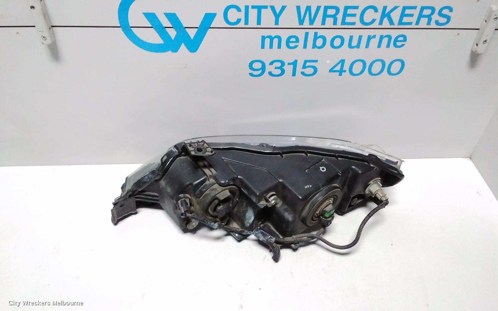 HONDA ODYSSEY RIGHT HEADLAMP, RB, HID, ELECT ADJ, KOITO LENS# 100-22497, BLUE MIDDLE EYE TYPE, 07/2004 - 03/2009
