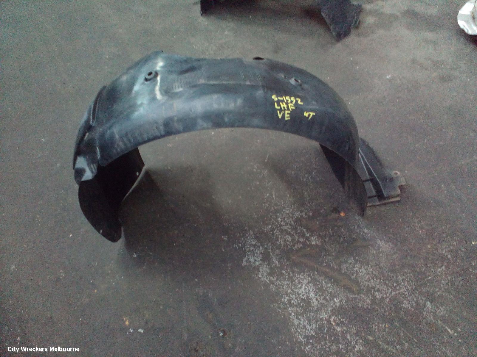 HOLDEN COMMODORE LEFT GUARD LINER, VE, FRONT, 08/2006 - 04/2013