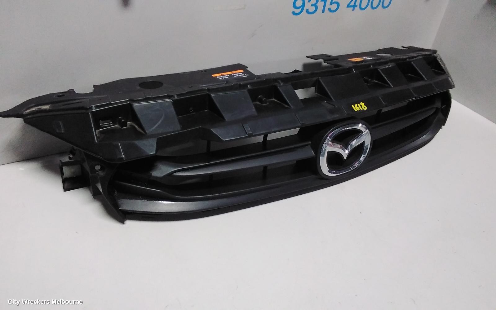 MAZDA 2 GRILLE, RADIATOR GRILLE, DJ, GENKI, UPPER-COLOUR CODED, 09/2014 - 10/2019
