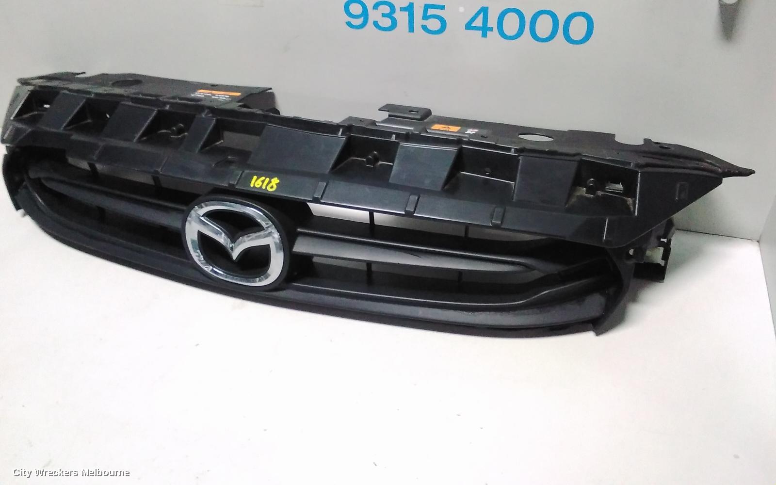 MAZDA 2 GRILLE, RADIATOR GRILLE, DJ, GENKI, UPPER-COLOUR CODED, 09/2014 - 10/2019