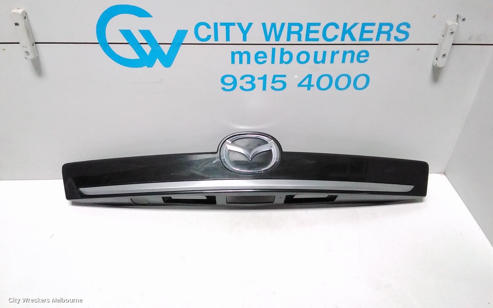 MAZDA CX9 REAR GARNISH, TAILGATE GARNISH (CENTRE), TB, 06/2009 - 10/2012