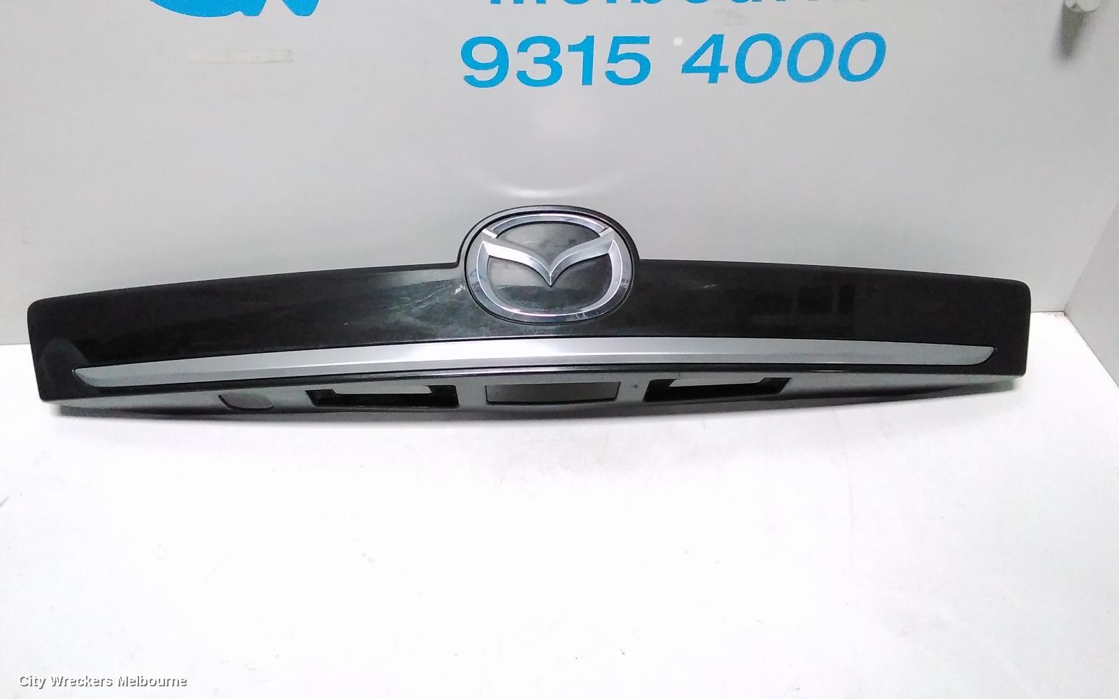 MAZDA CX9 REAR GARNISH, TAILGATE GARNISH (CENTRE), TB, 06/2009 - 10/2012