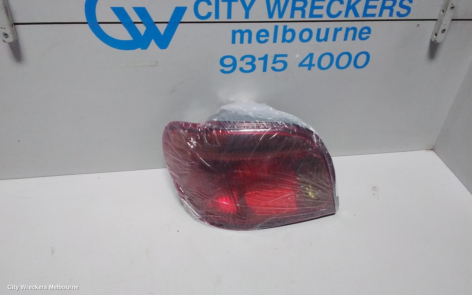 TOYOTA ECHO LEFT TAILLIGHT, NCP10R, HATCH, LENS# 52-049, 10/2002 - 09/2005