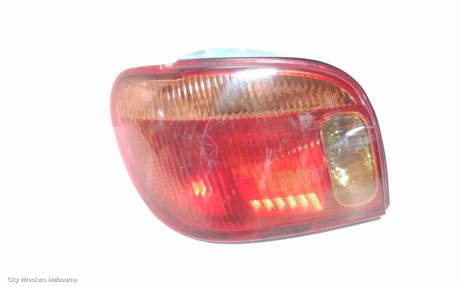 TOYOTA ECHO LEFT TAILLIGHT, NCP10R, HATCH, LENS# 52-049, 10/2002 - 09/2005