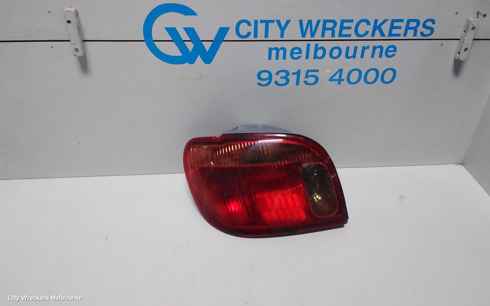TOYOTA ECHO LEFT TAILLIGHT, NCP10R, HATCH, LENS# 52-049, 10/2002 - 09/2005