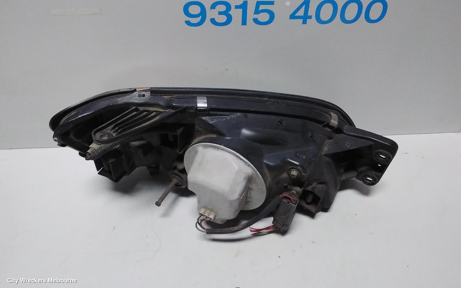SUBARU LIBERTY LEFT HEADLAMP, 3RD GEN, BLACK INSERT, 11/1998 - 06/2001