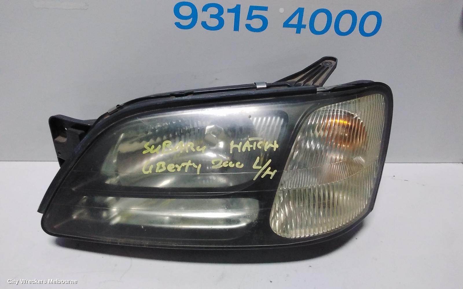 SUBARU LIBERTY LEFT HEADLAMP, 3RD GEN, BLACK INSERT, 11/1998 - 06/2001