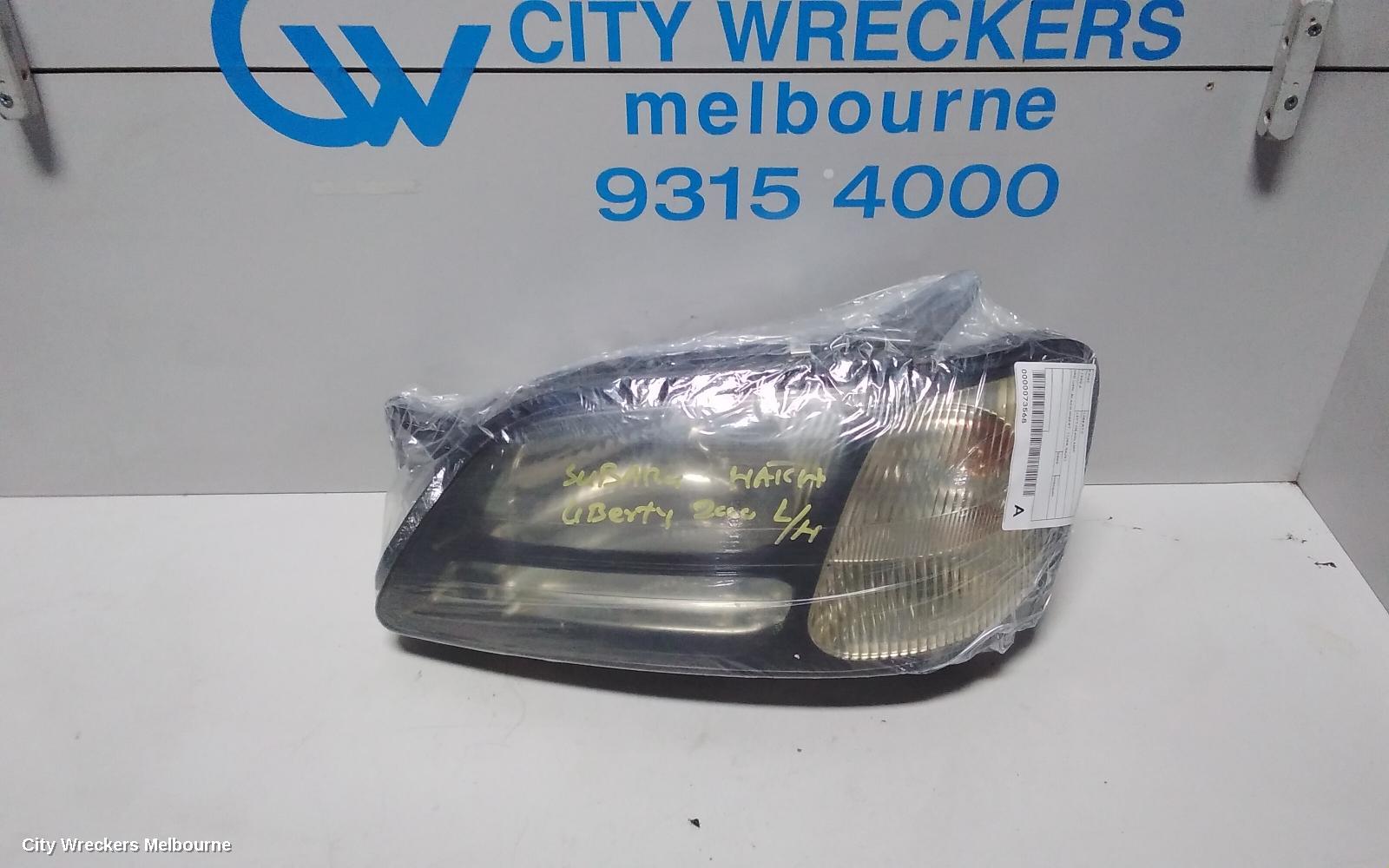 SUBARU LIBERTY LEFT HEADLAMP, 3RD GEN, BLACK INSERT, 11/1998 - 06/2001