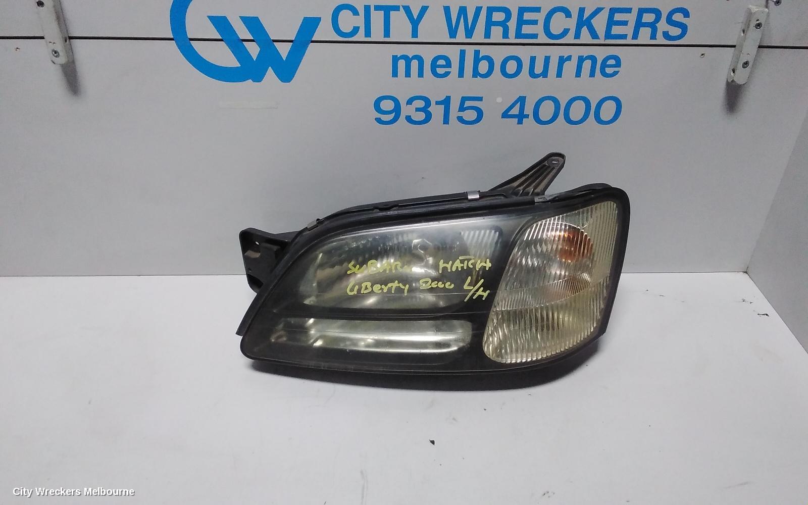 SUBARU LIBERTY LEFT HEADLAMP, 3RD GEN, BLACK INSERT, 11/1998 - 06/2001