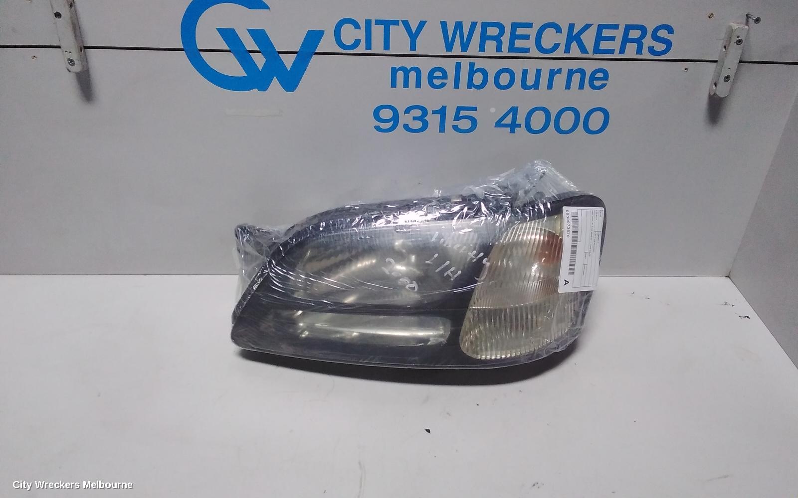 SUBARU LIBERTY LEFT HEADLAMP, 3RD GEN, BLACK INSERT, 11/1998 - 06/2001