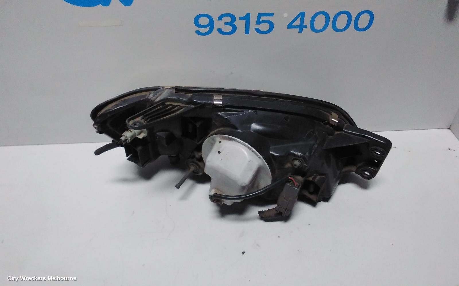 SUBARU LIBERTY LEFT HEADLAMP, 3RD GEN, BLACK INSERT, 11/1998 - 06/2001