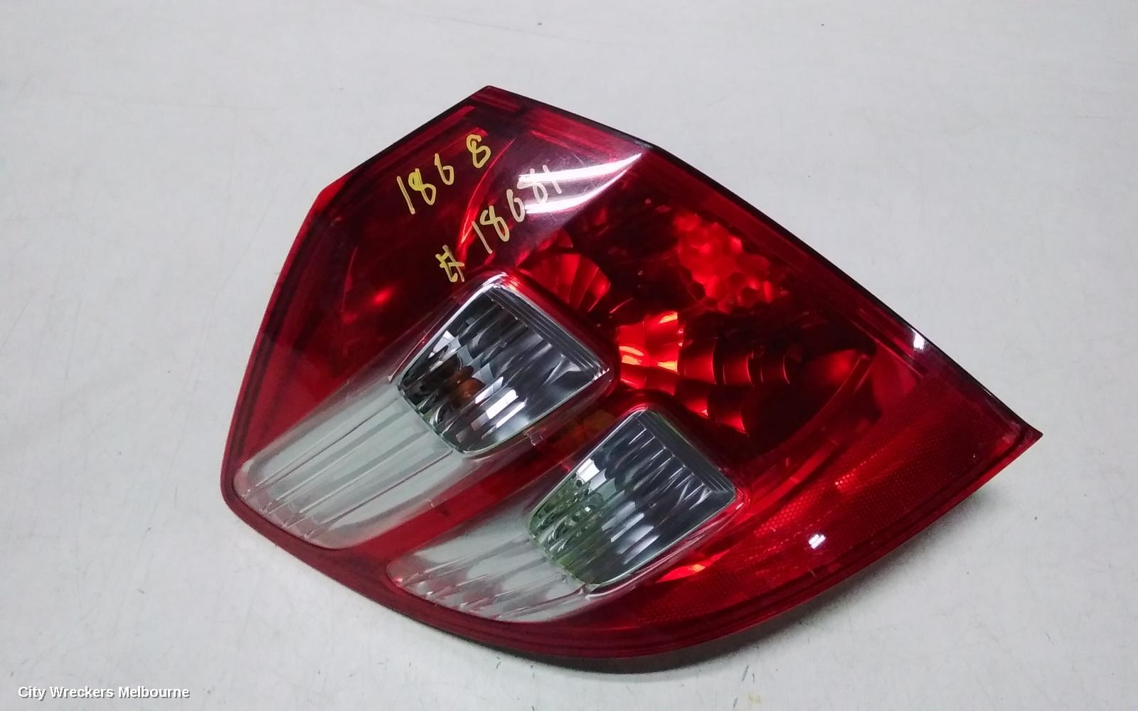HONDA JAZZ LEFT TAILLIGHT, GE, LENS# 7030, 08/2008 - 03/2011