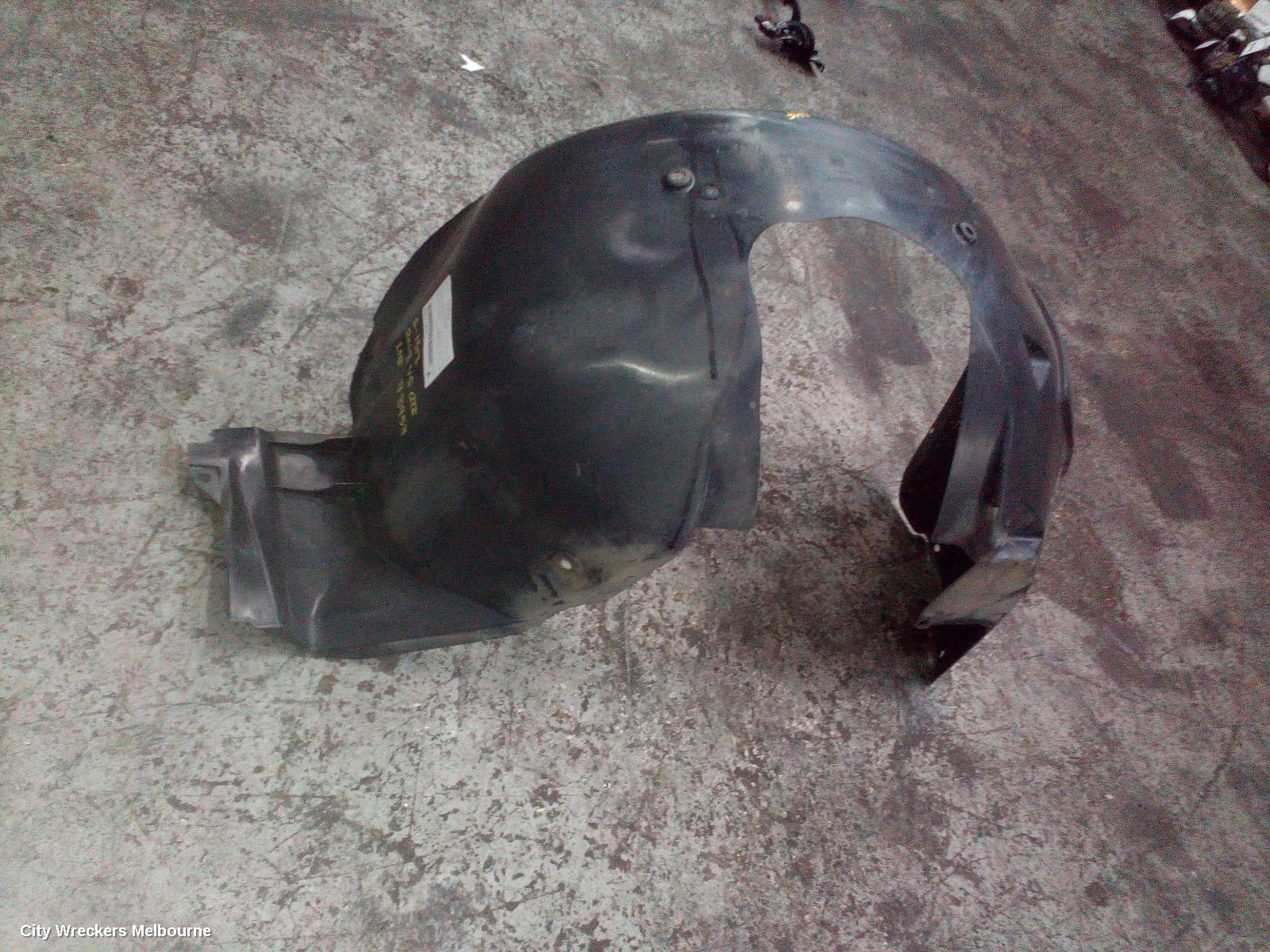 HOLDEN COMMODORE LEFT GUARD LINER, VE, FRONT, 08/2006 - 04/2013
