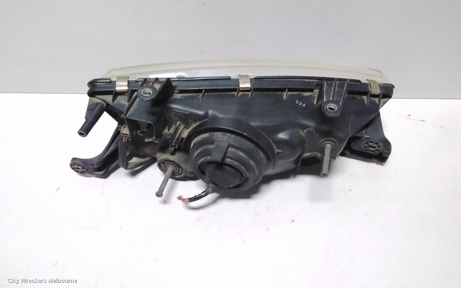SUBARU LIBERTY LEFT HEADLAMP, 2ND GEN, KOITO LENS# 100-20588, 06/1994 - 01/1999