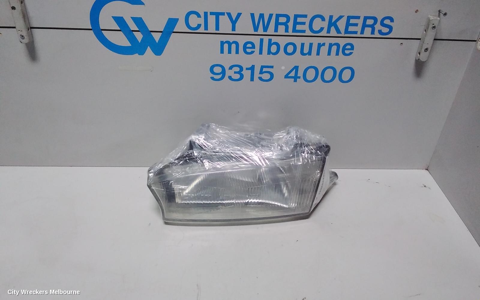 SUBARU LIBERTY LEFT HEADLAMP, 2ND GEN, KOITO LENS# 100-20588, 06/1994 - 01/1999