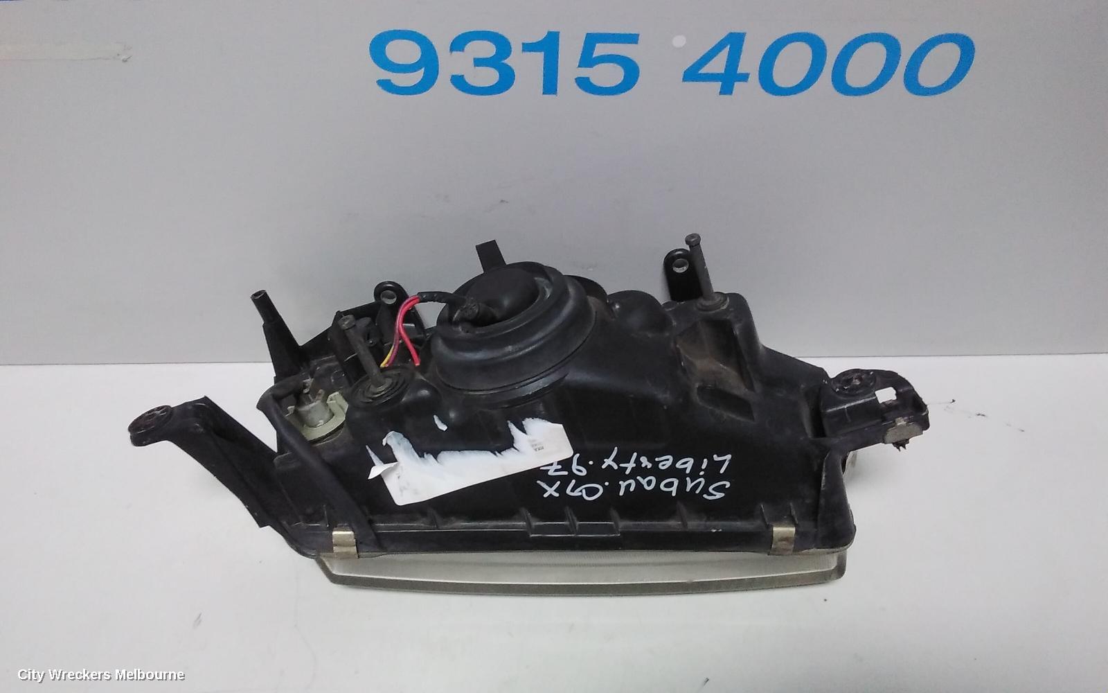 SUBARU LIBERTY LEFT HEADLAMP, 2ND GEN, KOITO LENS# 100-20588, 06/1994 - 01/1999