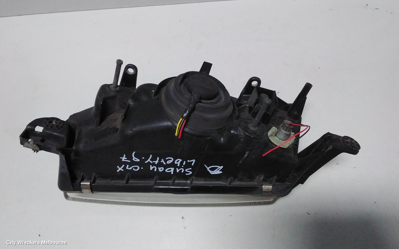 SUBARU LIBERTY RIGHT HEADLAMP, 2ND GEN, KOITO LENS# 100-20588, 06/1994 - 01/1999