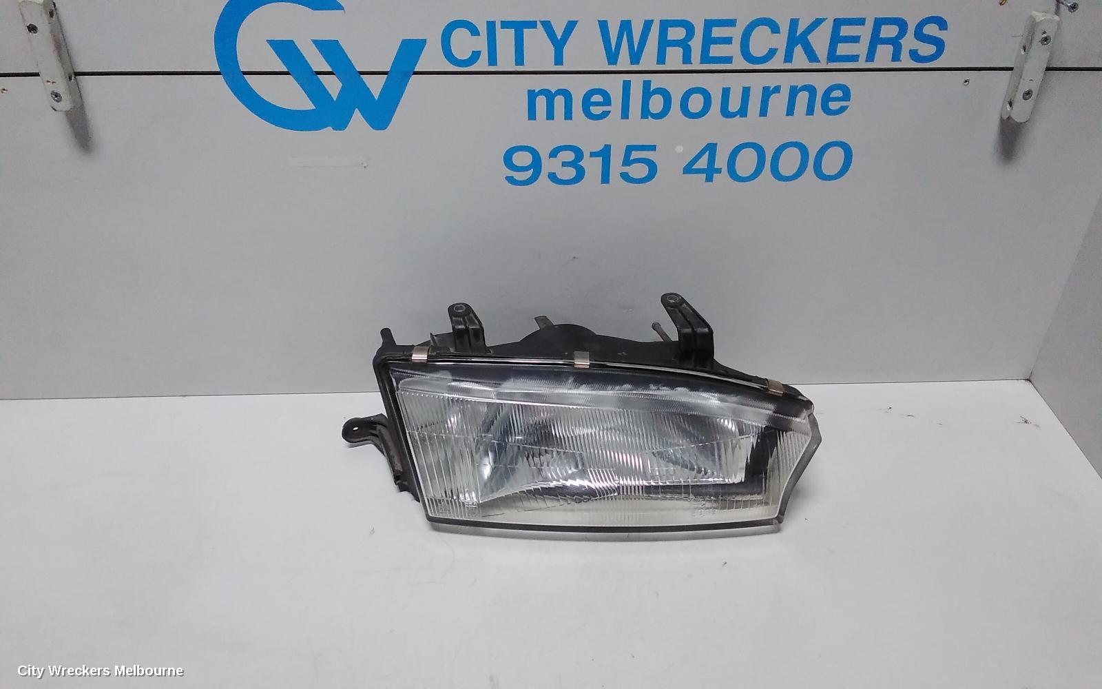SUBARU LIBERTY RIGHT HEADLAMP, 2ND GEN, KOITO LENS# 100-20588, 06/1994 - 01/1999
