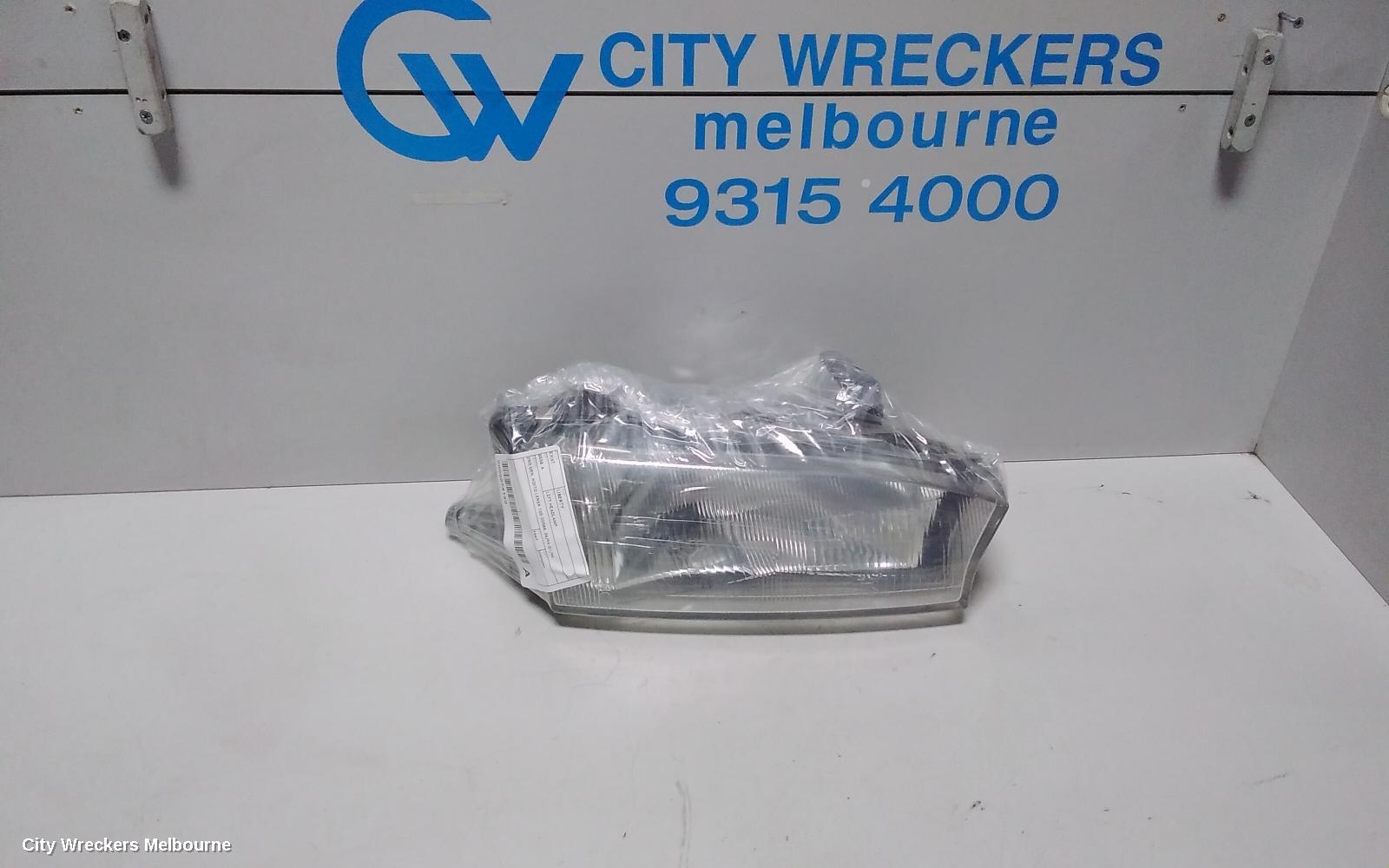 SUBARU LIBERTY RIGHT HEADLAMP, 2ND GEN, KOITO LENS# 100-20588, 06/1994 - 01/1999