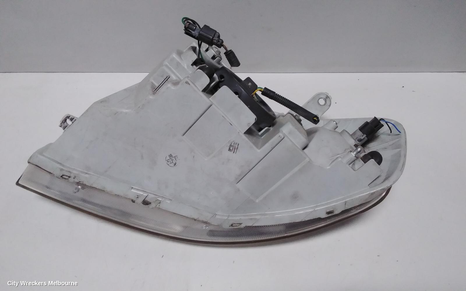 HOLDEN BARINA RIGHT HEADLAMP, TK, SEDAN, 12/2005 - 12/2012