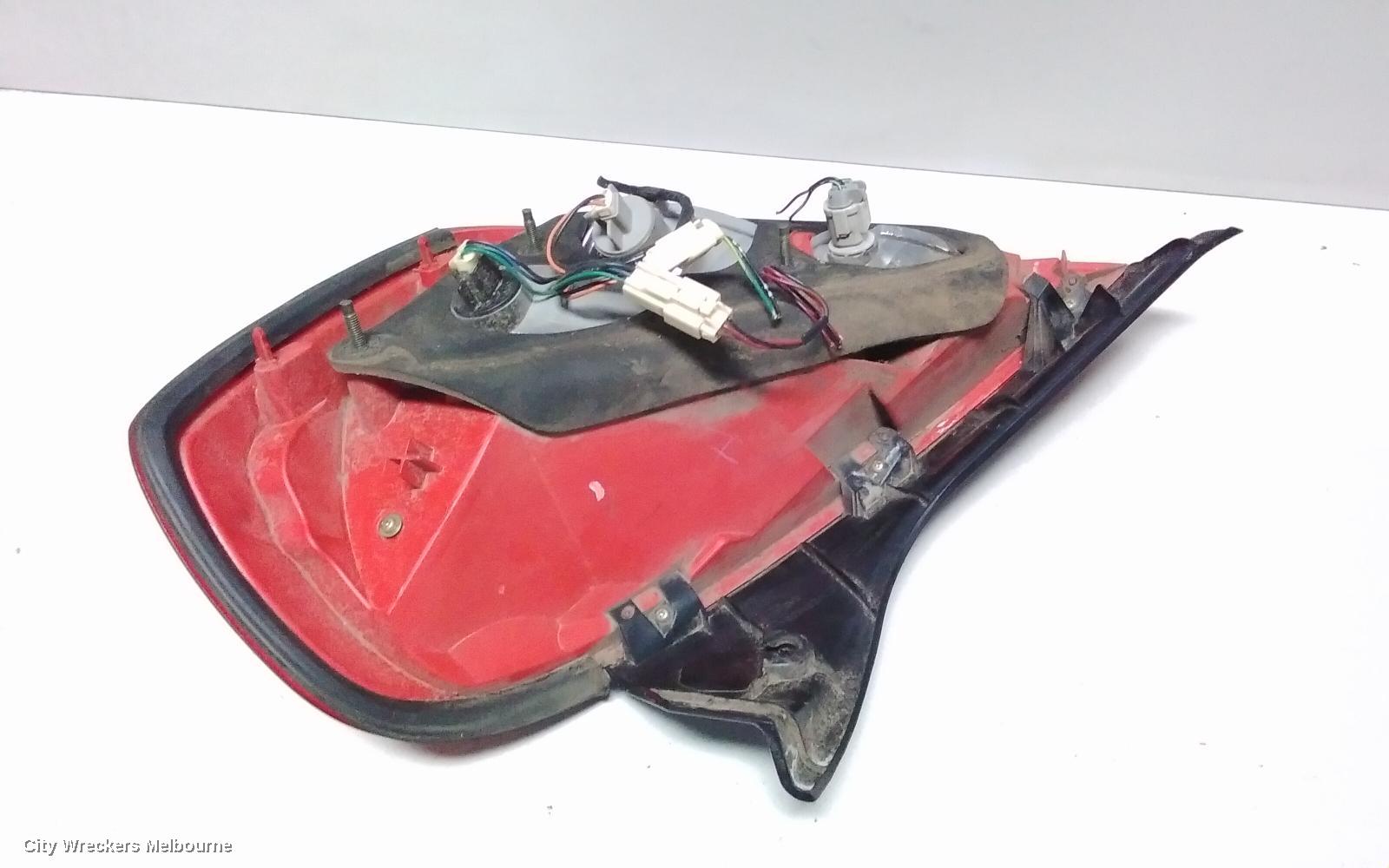 NISSAN MAXIMA LEFT TAILLIGHT, J31, LENS# 4969, 02/2002 - 12/2005