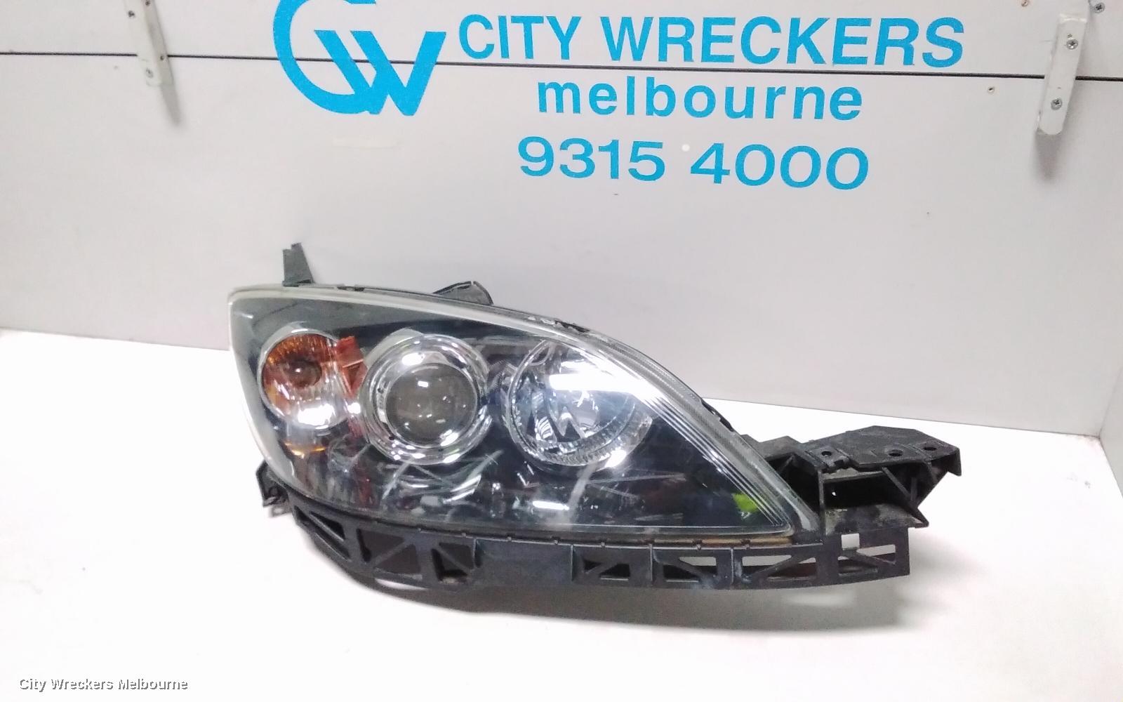 MAZDA 3 RIGHT HEADLAMP, BK, HATCH, NON HID, MANUAL ADJUST TYPE, 10/2003 - 04/2009